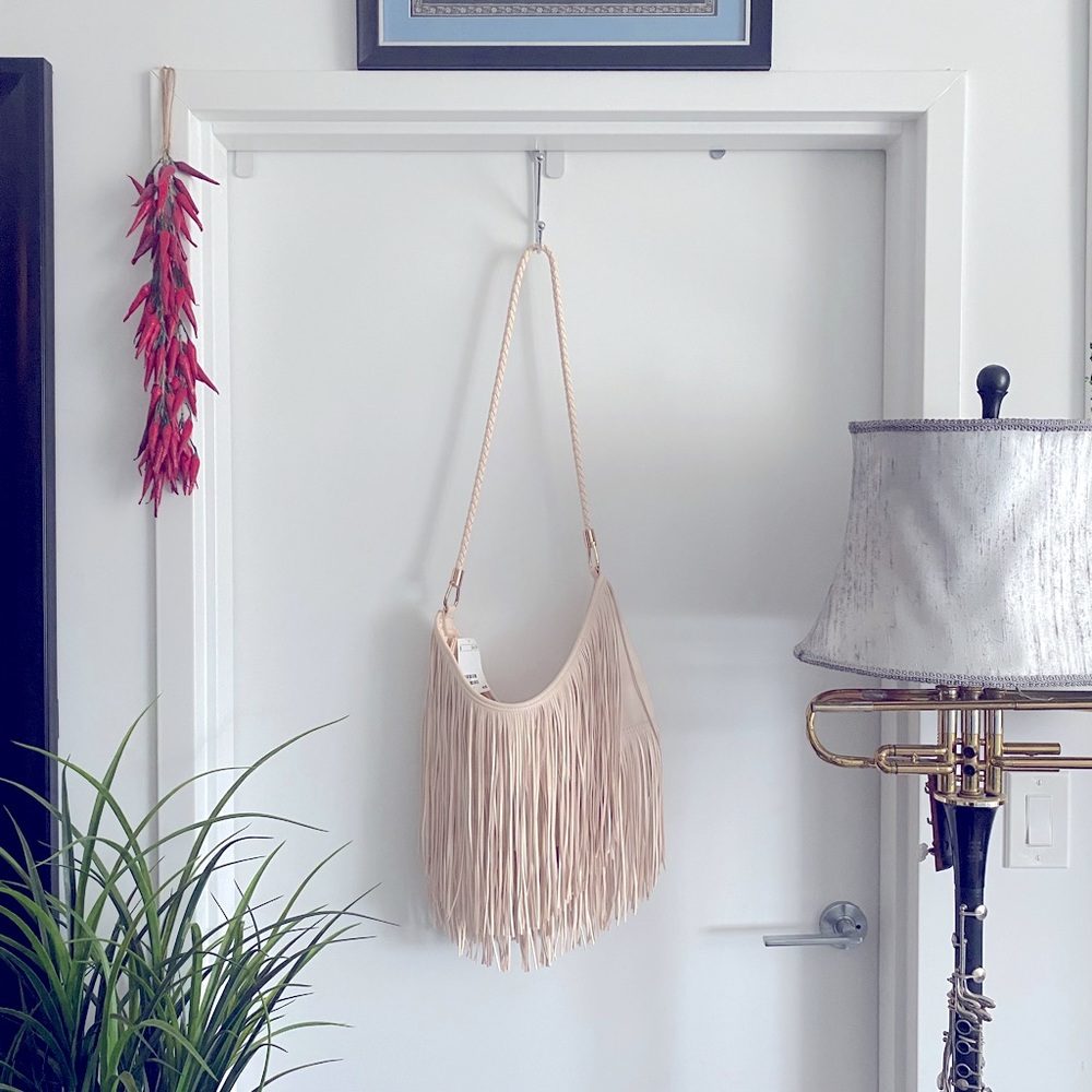 Brand new (never used) H&M cream fringe purse